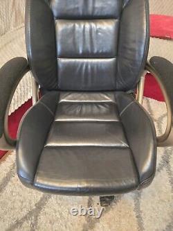 Converted used black leather car seat (AUDI A6) to office swivel reclining chair